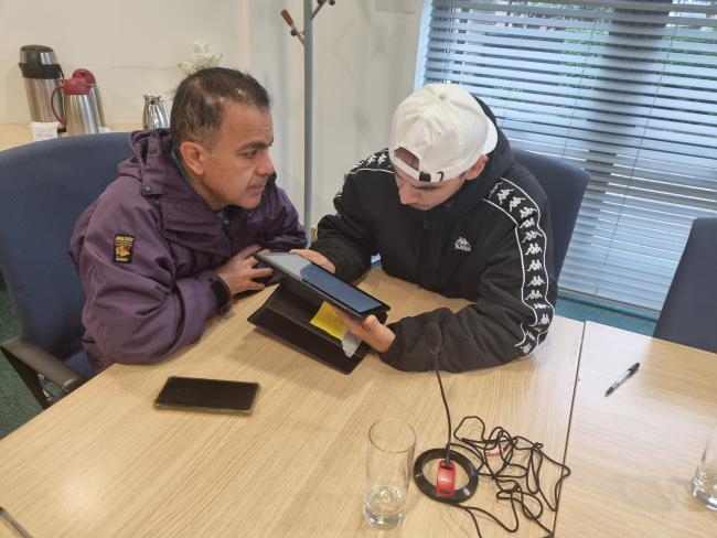 Volunteers reviewing their work in Leeds
