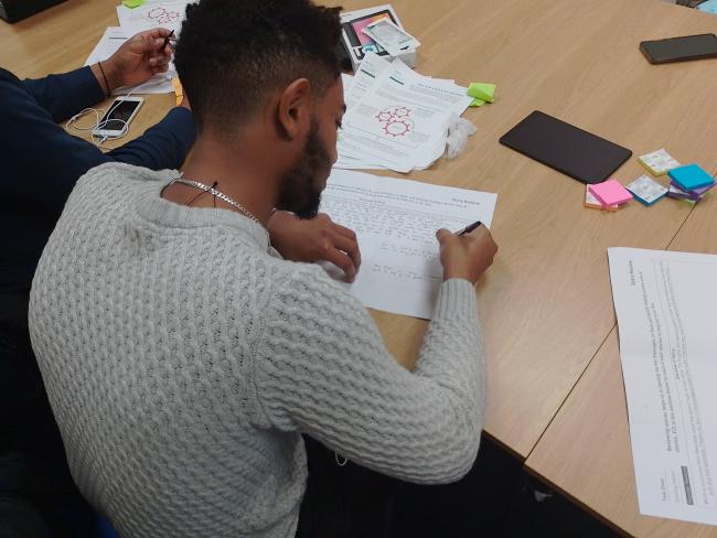  A volunteer reviewing their story