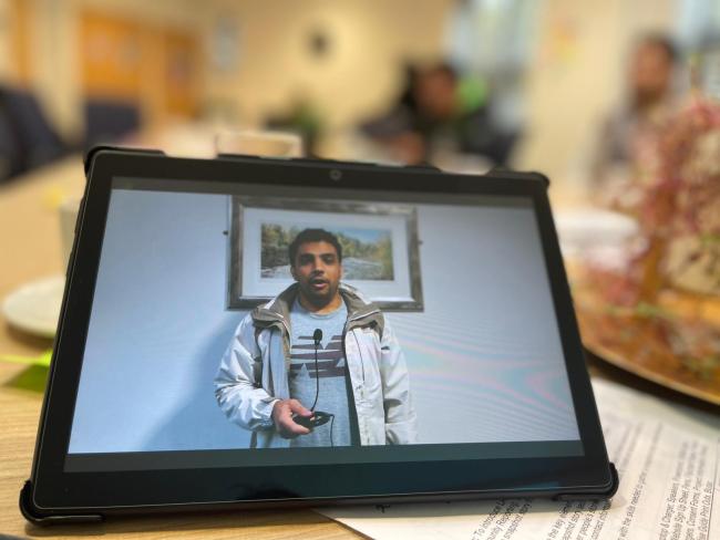 A volunteer on screen